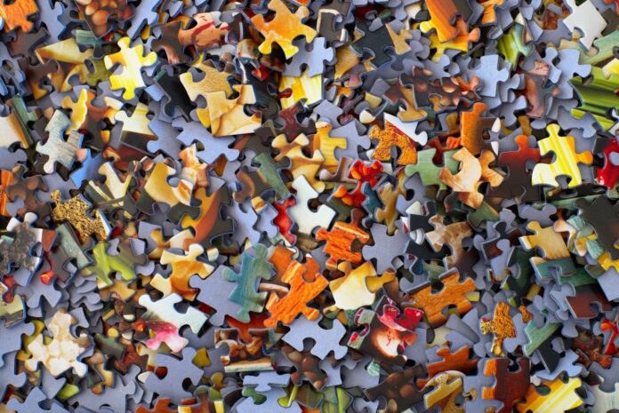 Photo by Hans-Peter Gauster stack of jigsaw puzzle pieces