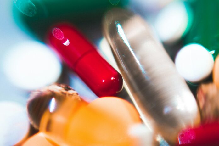 Photo by Nastya Dulhiier a close up of a bunch of pills